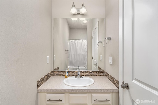 18410 20th Avenue Ct E, Spanaway, WA 98387 - full bath featuring backsplash, vanity, and curtained shower