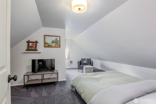 100 Aspen Ln, Packwood, WA 98361 - carpeted bedroom with vaulted ceiling and baseboards