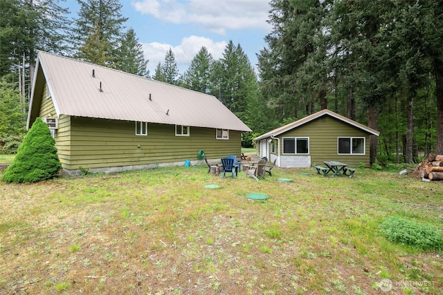 100 Aspen Ln, Packwood, WA 98361 - rear view of property featuring metal roof