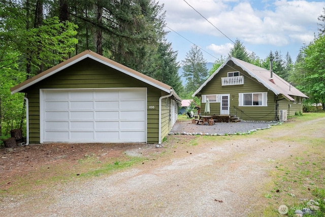 100 Aspen Ln, Packwood, WA 98361 - view of front of home featuring a garage and an outbuilding