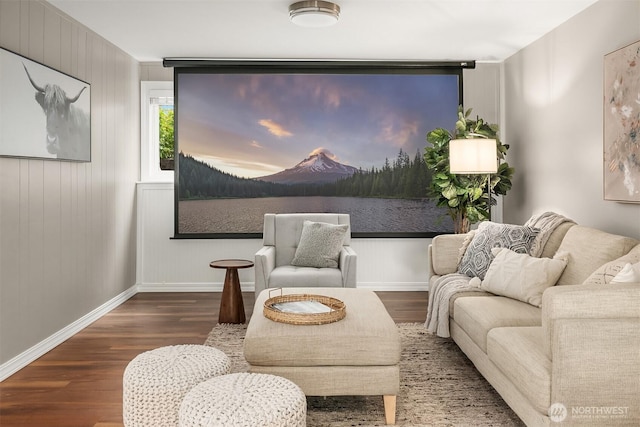 living area featuring wood finished floors and baseboards