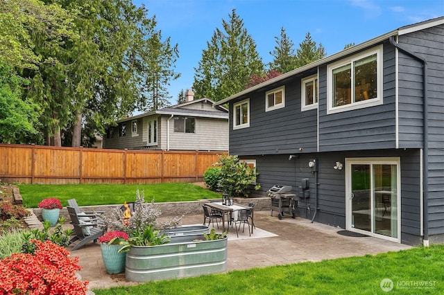 back of property with a patio area