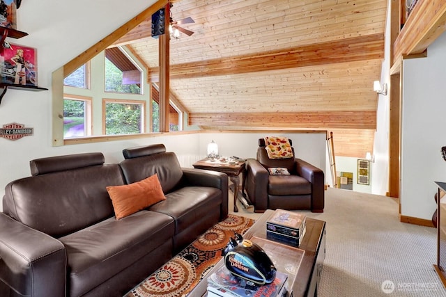 carpeted living room with wood walls, ceiling fan, and baseboards