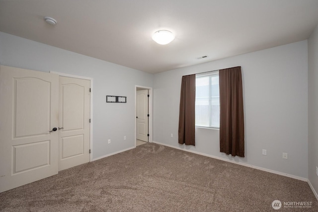 725 Penrose St, Moses Lake, WA 98837 - unfurnished bedroom with carpet floors and baseboards