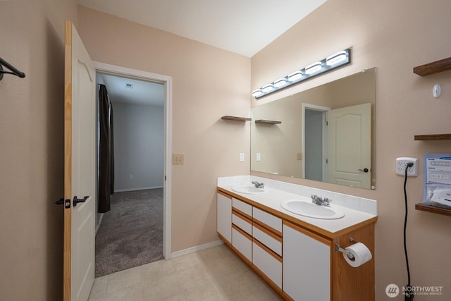 725 Penrose St, Moses Lake, WA 98837 - bathroom with double vanity and baseboards