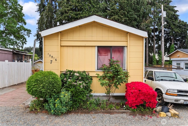 15016 W Thorne Ln SW Unit 7, Lakewood, WA 98498 - view of front of home featuring fence