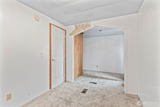 15016 W Thorne Ln SW Unit 7, Lakewood, WA 98498 - carpeted spare room featuring a smoke detector