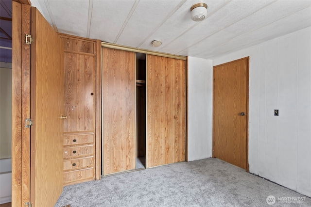 15016 W Thorne Ln SW Unit 7, Lakewood, WA 98498 - unfurnished bedroom with carpet floors and a closet