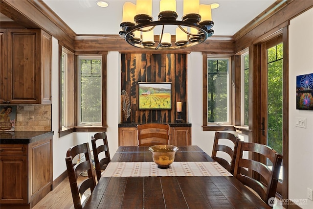 1390 Snowberry Loop, Cle Elum, WA 98922 - dining space with a chandelier, wood finished floors, recessed lighting, ornamental molding, and baseboards