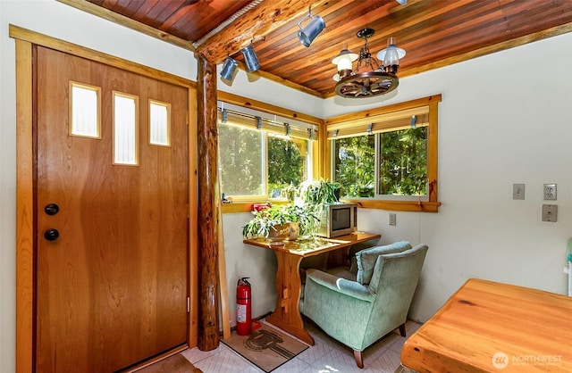 18242 643rd Ave NE Unit 54, 53, Baring, WA 98224 - tiled foyer entrance with wood ceiling, a chandelier, and beam ceiling