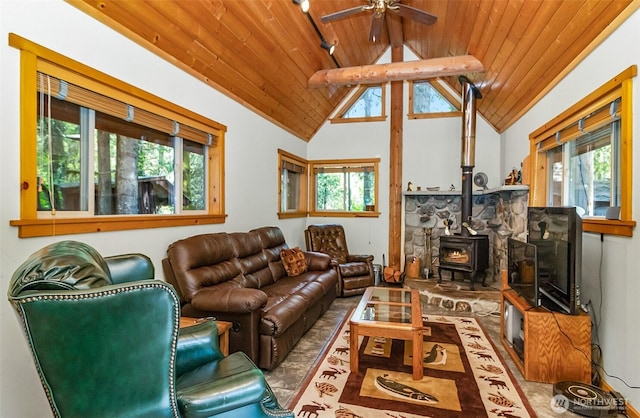 18242 643rd Ave NE Unit 54, 53, Baring, WA 98224 - living room with wood ceiling, ceiling fan, a wood stove, and plenty of natural light