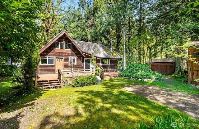 18242 643rd Ave NE Unit 54, 53, Baring, WA 98224 - rear view of house featuring a lawn and a wooden deck