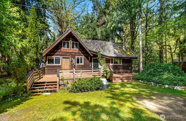18242 643rd Ave NE Unit 54, 53, Baring, WA 98224 - back of property with a yard and a wooden deck
