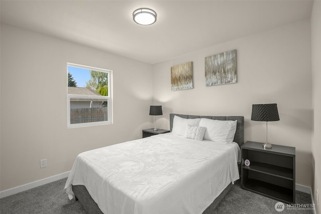1319 E 56th St, Tacoma, WA 98404 - carpeted bedroom featuring baseboards