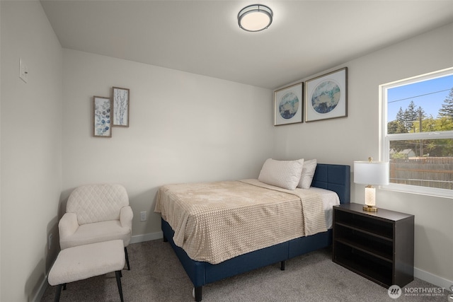 1319 E 56th St, Tacoma, WA 98404 - bedroom with carpet flooring and baseboards