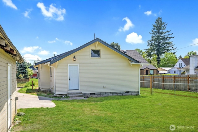 1319 E 56th St, Tacoma, WA 98404 - rear view of property featuring entry steps, crawl space, and a patio area