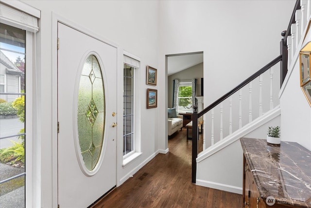 1438 NW 202nd Ln, Shoreline, WA 98177 - foyer featuring dark wood finished floors, stairs, baseboards, and a high ceiling