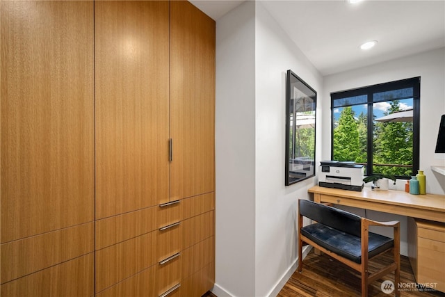 office area with baseboards, wood finished floors, and recessed lighting