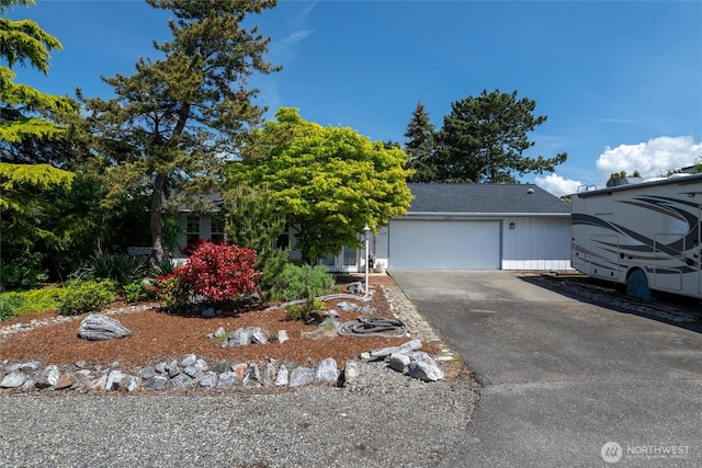 5418 Nootka Loop, Blaine, WA 98230 - obstructed view of property with driveway and a garage