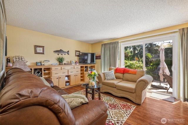 5418 Nootka Loop, Blaine, WA 98230 - living area with wood finished floors and a textured ceiling