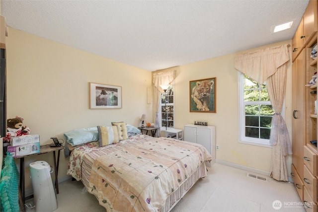 5418 Nootka Loop, Blaine, WA 98230 - bedroom with light carpet, baseboards, and a textured ceiling