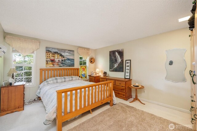 5418 Nootka Loop, Blaine, WA 98230 - carpeted bedroom featuring a textured ceiling