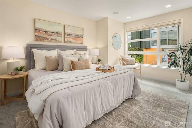 carpeted bedroom with baseboards and recessed lighting