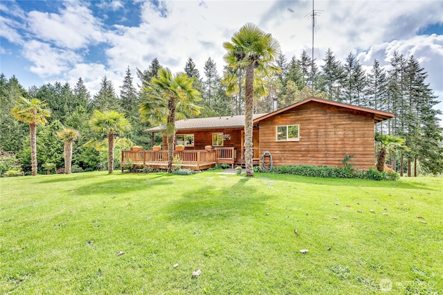 37611 Hansville Rd NE, Hansville, WA 98340 - rear view of house with a deck and a yard