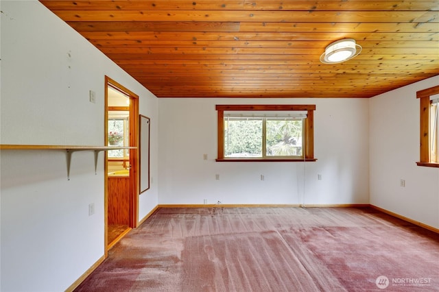 37611 Hansville Rd NE, Hansville, WA 98340 - carpeted spare room featuring wood ceiling and baseboards