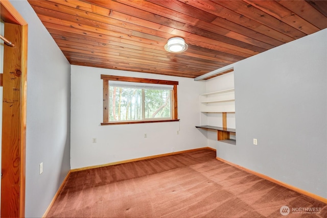 37611 Hansville Rd NE, Hansville, WA 98340 - carpeted empty room featuring wooden ceiling and baseboards