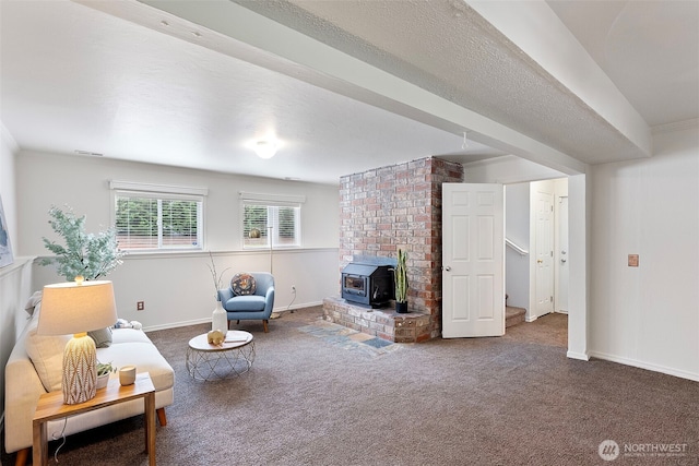living room featuring carpet floors, a wood stove, and baseboards