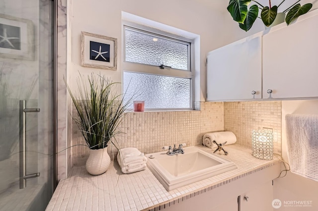 2545 NE 204th St, Shoreline, WA 98155 - bathroom with backsplash and a sink