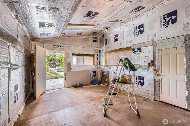 2545 NE 204th St, Shoreline, WA 98155 - miscellaneous room featuring a towering ceiling and concrete floors