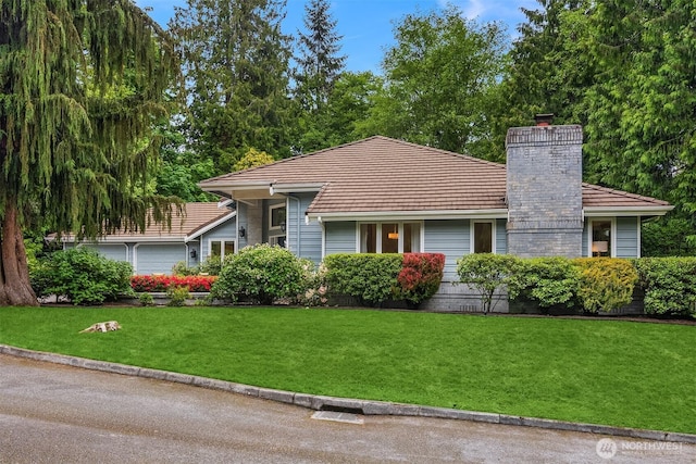 1118 2nd Ave S, Edmonds, WA 98020 - single story home with a chimney, a front lawn, and a tile roof