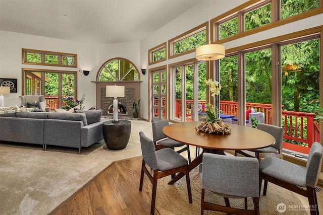 1118 2nd Ave S, Edmonds, WA 98020 - dining room featuring wood finished floors and a brick fireplace