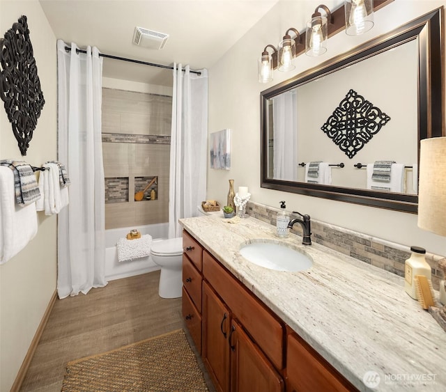 1118 2nd Ave S, Edmonds, WA 98020 - bathroom featuring toilet, vanity, and shower / bath combination with curtain