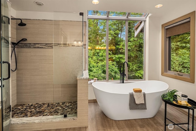 1118 2nd Ave S, Edmonds, WA 98020 - bathroom with a shower stall, a freestanding tub, and recessed lighting