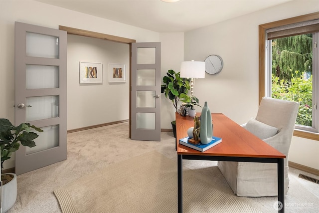 1118 2nd Ave S, Edmonds, WA 98020 - home office with healthy amount of natural light, carpet, and baseboards