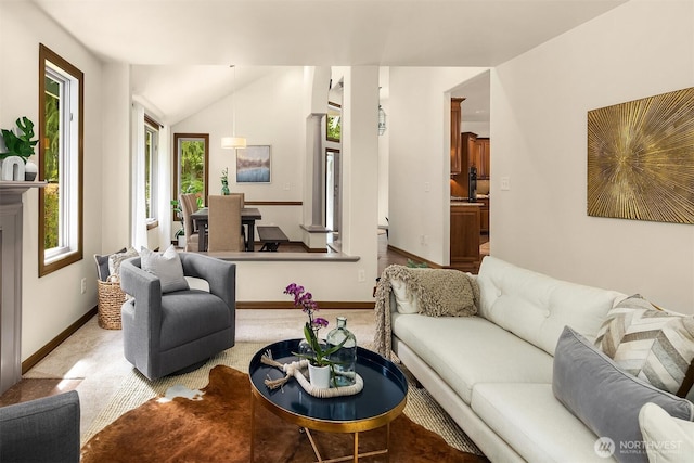 1118 2nd Ave S, Edmonds, WA 98020 - living area featuring carpet, baseboards, and vaulted ceiling