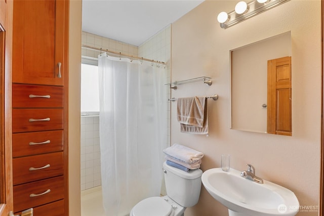 20501 Delta Rd NW, Soap Lake, WA 98851 - full bath featuring a sink, a stall shower, and toilet