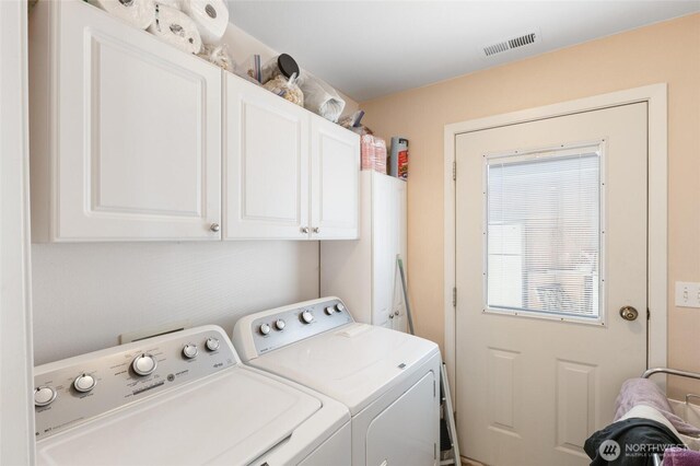 20501 Delta Rd NW, Soap Lake, WA 98851 - laundry room featuring separate washer and dryer and cabinet space