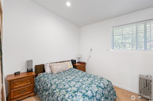 20501 Delta Rd NW, Soap Lake, WA 98851 - bedroom featuring radiator, light carpet, baseboards, recessed lighting, and lofted ceiling