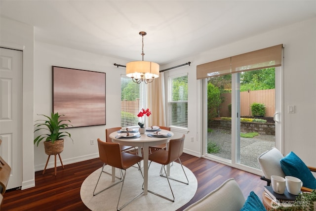 18808 19th Dr SE, Bothell, WA 98012 - dining space featuring a chandelier, wood finished floors, and baseboards