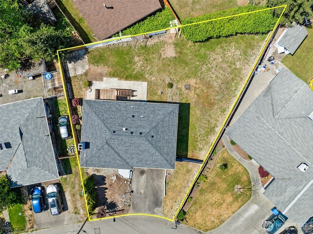 aerial view of property and surrounding area with property boundaries highlighted