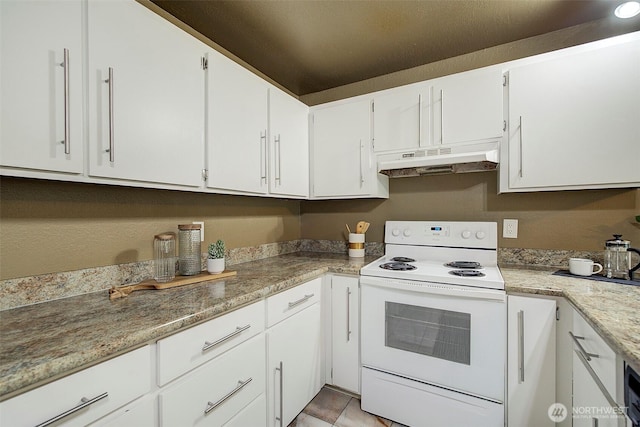 kitchen with white electric stove, under cabinet range hood, and white cabinets