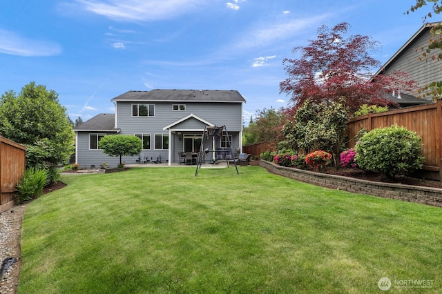 rear view of property with a patio area