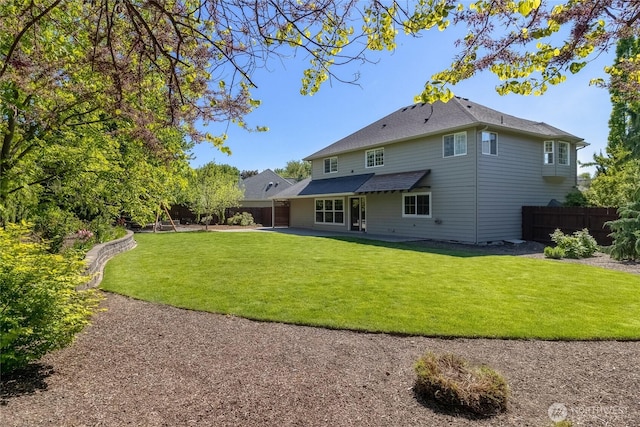 back of house with a patio area