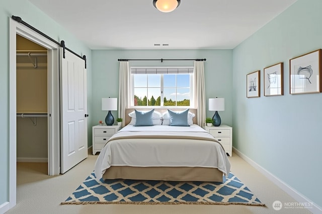 1224 Studebaker Pl, Walla Walla, WA 99362 - carpeted bedroom featuring a barn door and a closet