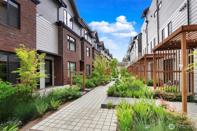 surrounding community with a residential view