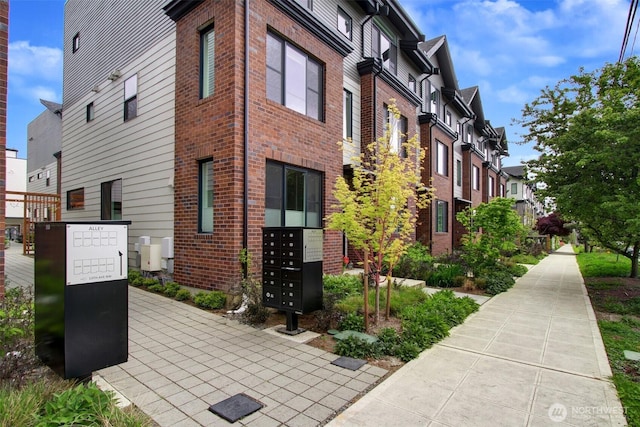 view of building exterior with a residential view